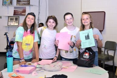 Kids doing arts and crafts at Camp Fantastic